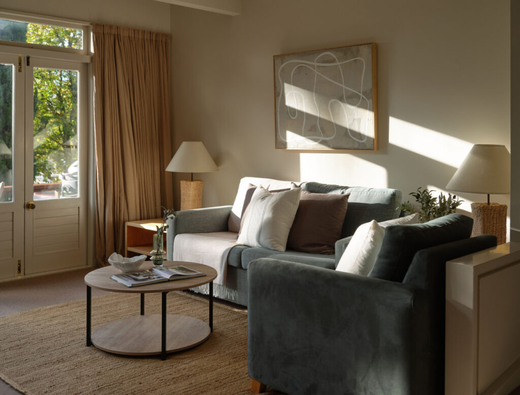 Cosy, minimalist chalet living room with neutral tones